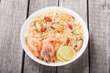 Instant noodles soup with shrimps and mssels . Asian food