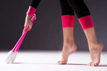 Accessories for rhythmic gymnastics near teenage legs  clubs