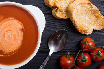 Fresh tomato cream soup in bowl