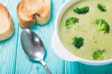 Fresh broccoli cream soup in bowl