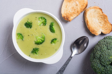 Fresh broccoli cream soup in bowl
