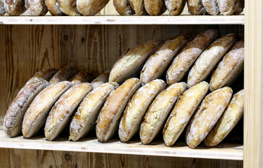 many pieces of wholemeal bread in a bakery
