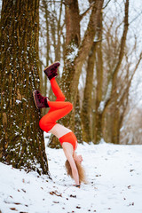 Fit woman warming up morning winter training