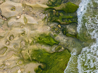 Aerial top view of beautiful Balangan beach. Unique texture in the coast, photo from drone. Bali, Indonesia.