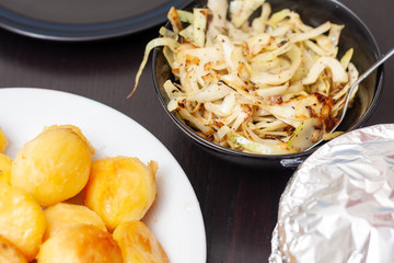 A bowl of fried white cabbage and herbs