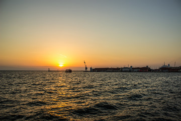 sea shire line waterfront port city district in sunset evening time