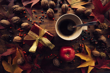 Autumn gift box with cup of coffee
