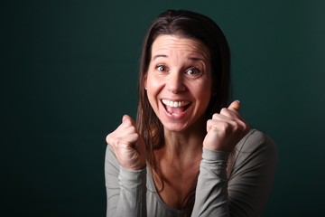 Portrait of a woman in front of a colored background