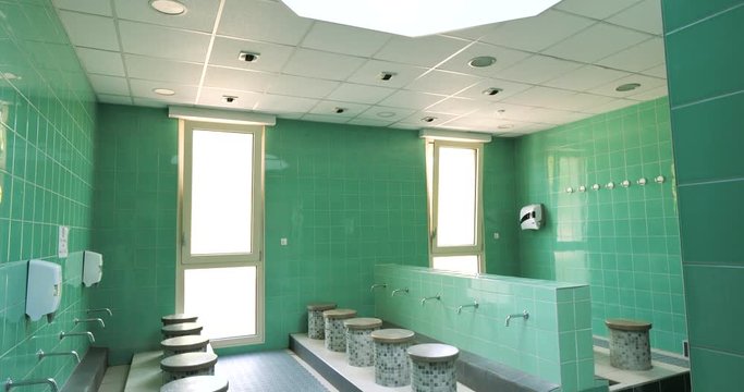 Tilt-down inside ablution room - Strasbourg Great Mosque or Grande Mosquee de Strasbourg with beautiful green tiles