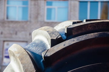 Clean new modern tractor or harvester tire. Close up view of surface