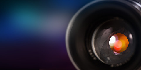 Fototapeta na wymiar Professional camera lens with reflections.