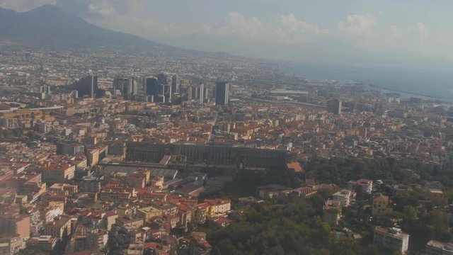 Cityscape of Naples from landing airplane. Aerial view of big city
