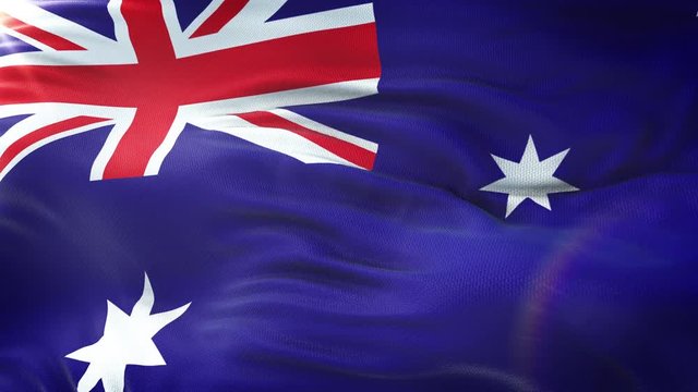Flag of Australia waving on sun. Seamless loop with highly detailed fabric texture. Loop ready in 4k resolution.