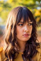 Naklejka premium Head portrait of pretty woman outdoor