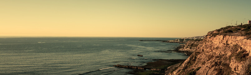 Panorama view on cliffs at sunset, Praia da Foz, Portugal