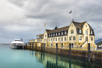 Obraz premium An Art Nouveau building at the Hurtigrut dock at the Port of Harstad, Troms County, Norway.