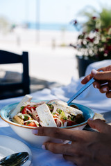 Greek salad with fresh vegetables, feta cheese and black olives