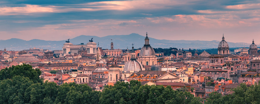 Fototapeta Panoramic aerial wonderful view of Rome with Altar of the Fatherland and churches at sunset time in Rome, Italy