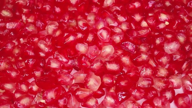Pomegranate seeds red seed pomegranates looping texture pattern closeup video