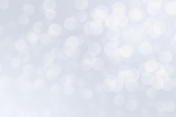 Abstract white bokeh lights effect, soft blurred background