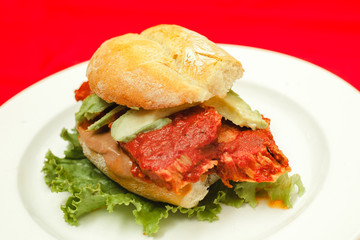 torta de pierna enchilada, christmas food in mexico spicy food, spicy pork leg