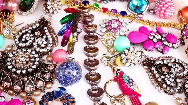 Earrings bijou trinket jewels jewelry looping texture pattern closeup video