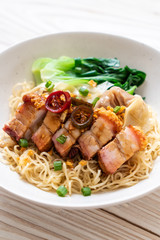 egg noodle soup with crispy pork belly and wonton