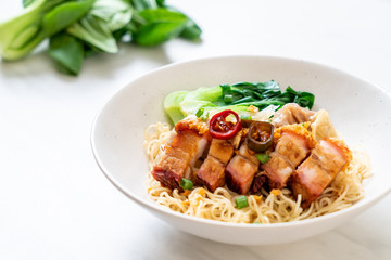 egg noodle soup with crispy pork belly and wonton