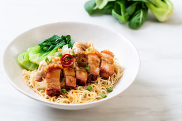 egg noodle soup with crispy pork belly and wonton