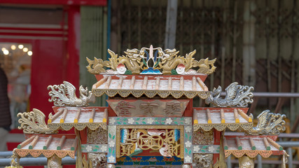 Chinese shrine with dragon above