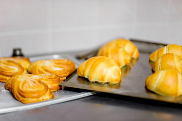 different kinds of pastry in a modern bakery