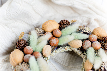Autumn composition with dry leaves and ripe pumpkins