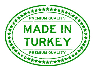 Grunge green premium quality made in Turkey oval rubber stamp on white background