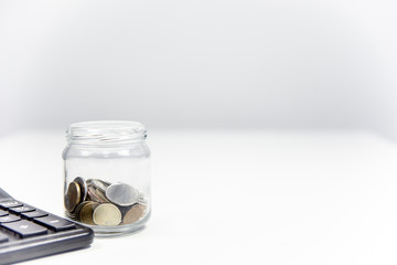 retirement fund concept - money and a calculator