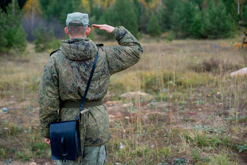 a portrait of a brave soldier standing