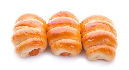 Sausage in dough .Isolated on white background