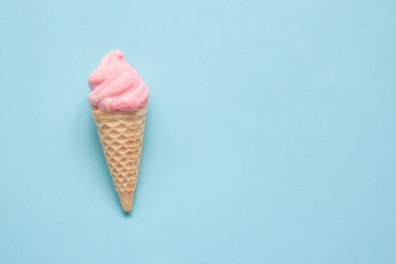 Sweet cone on blue pastel colour background