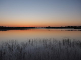 Fototapeta na wymiar Sunrise on a perfectly calm Nine Mile Pond in Everglades National Park, Florida.