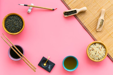 Chinese traditional symbols concept. Tea, rice, hieroglyph love, bambootabe mat, chopsticks, soy...