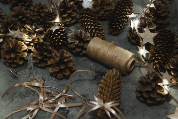 Pinecones on stone background. Christmas decorations. 