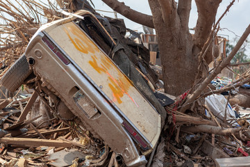 Car Blown Into Tree by Powerful Tornado
