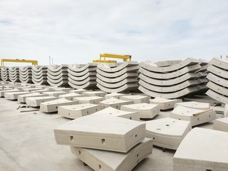 Precast concrete plant with blue sky in the construction site, in storage yard area at Thailand, Space for text in template.