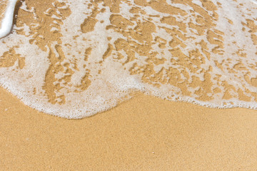 tropic island beach ,  clear water waves and  beautiful sands 