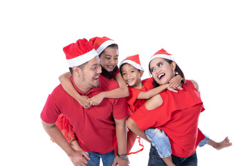 happy asian family wearing red christmas