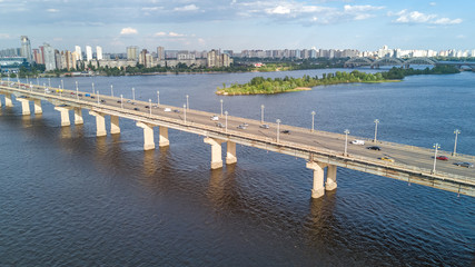 Fototapeta na wymiar Aerial top view of Paton bridge and Dnieper river from above, city of Kiev, Kyiv cityscape skyline, Ukraine 