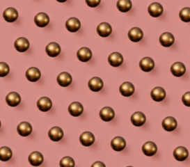 Golden Christmas balls pattern on pink background