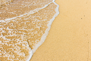pure sands and clear sea water at the beach in summer 