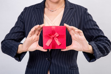 Red gift box from business woman