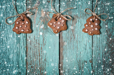 Christmas wooden background with cookies. Turquoise wooden table.