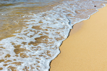 pure sea water waves at the beach 